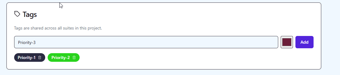 QAM Hub tag management showing colored tag badges with names in project settings